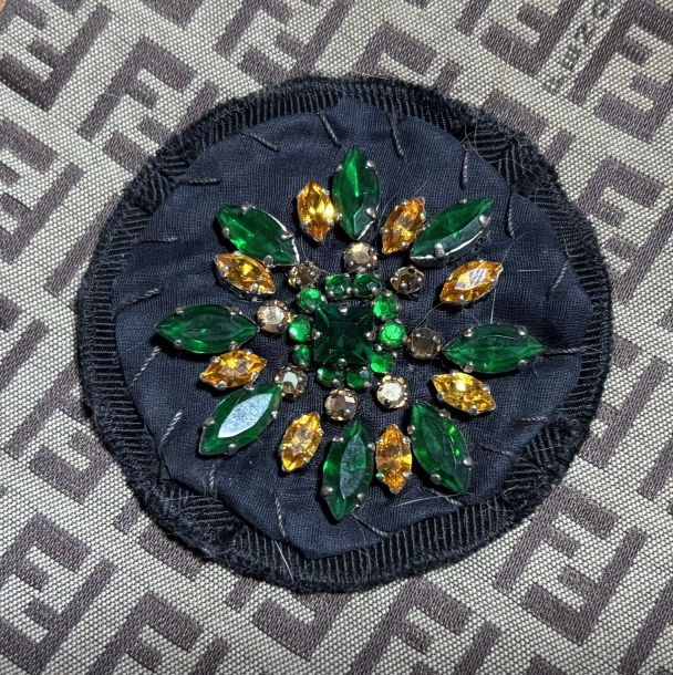 Prada brooch 